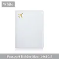 White PU leather passport holder with gold airplane charm and stitched edges 14x10.5cm - White