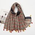 Detail of bohemian geometric print scarf with colorful tassel edges and cotton linen texture - XB1006-01 Navy Brick Red Geometric Tassels