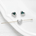 Macro detail of heart-shaped silver charms with emerald green zircon for DIY jewelry making - 9# White Gold - Green Zircon