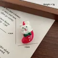 Christmas bear resin badge pin featuring a white bear in a red sock for DIY jewelry - Stocking Bear