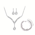 Detail view of silver bridal jewelry set with water drop rhinestones and wave patterns - 14# Silver Exquisite Water Drop Set