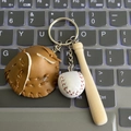 Mini baseball keychain set with brown leather glove, wooden bat and ball on keyboard - Khaki