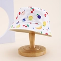 Kids cotton sun hat with colorful fruit print on a wooden stand for outdoor protection - Kids One Size / White (Hand-drawn Fruit)
