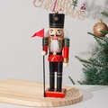Classic 25cm wooden Christmas nutcracker soldier decor with red flag on a festive base - Flag Soldier