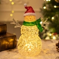 Leuchtende Kristall-Schneemann-Figur mit warmem LED-Licht und festlicher roter Mütze - Acryl Schneemann Grüner Schal
