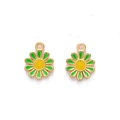 Close-up of golden daisy charms with green enamel petals and yellow center detail - Green