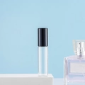 Transparent glass roller bottle for essential oils with a sleek black plastic cap - 5ml Black