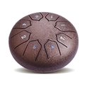 Close-up of brown steel tongue drum with textured surface and eight numeric note markers - Bronze - Lotus (6 Inch 8 Notes)