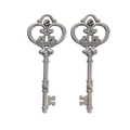 Close-up of vintage crown key charms with intricate hollow patterns in silver finish - Gun Black
