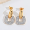 Macro shot of U-shaped gold earrings with paved zircon stones and twisted metal detailing - ES2739 U-Shape Door Knocker