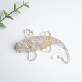 Transparent resin koi fish ornament with blue glitter and gold foil accents - White Crystal