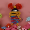 Handmade crochet monster key cover with funny sausage lips and vibrant colorful yarn - Dark Blue Gradient