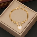 Detailed shot of golden heart pendant bracelet with U-link chain on display box - 6# Heart (B496)