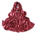 Close-up of dark red satin silk scarf showing smooth texture and elegant pearl luster - Coral Red