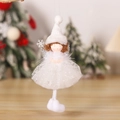 Close-up of white plush Christmas angel doll with lace skirt and silver sequins - White Angel