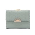 Close-up of light green PU leather wallet with diamond quilting and gold leaf buckle - Green