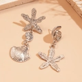 Asymmetric silver sea star and shell drop earrings with metallic texture and ocean motifs - Silver (Silver Pin) / Silver