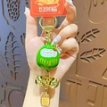 Groene Maneki Neko gelukskat sleutelhanger met gouden bellen en gelukshanger - OPP Tas Verpakking / Groen