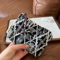 Detail of handmade cotton linen coin purse with black and white floral embroidery - Black