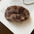Close-up of leopard print faux fur hair clip with a gold handmade metal tag detail - Duckbill Hair Clips / Light Coffee Leopard