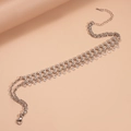 Elegante meerlaagse zilveren choker met zirkoonkwastjes en luxe kristallen accenten - Zilver