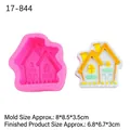 Pink silicone house mold and finished DIY candle with yellow roof on white background - Style 1 Cottage / Pink