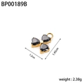 Detailed view of a gold clover pendant with black heart gems and dimensions 1.45cm x 1.2cm - BP00189B-Gold Black Stone Clover Pendant