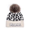 Detailed knit texture of leopard print winter hat with fluffy pom pom and MAMA embroidery - Leopard-MAMA