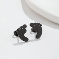 Close-up of black footprint earrings made of durable stainless steel for a cute look - Footprint Black