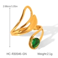 Detail view of a gold-plated stainless steel ring with a green teardrop zircon stone - Streamlined Pear Gem Style (HC-R30546-GN)