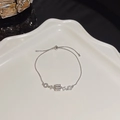 Adjustable silver bracelet with zircon cylinder pendant and pearl accents on ceramic tray - S320 Silver