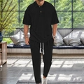 Men's casual black knit polo shirt and jogger pants set with waffle texture - Black