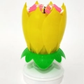 Rotating lotus flower music birthday candle in yellow petals with green leaf base - Layered Style / Yellow