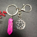 Natural pink crystal point keychain with silver star charm on black leather surface - Rose Red (Pentagram)