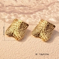 Detailed view of golden irregular square earrings with hammered texture and dimensions - Gold Hammered Square Studs