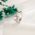 Silver star hoop earring featuring a pink round zircon stone with diamond accents - Pink Zirconia