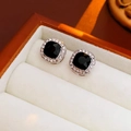 Macro shot of silver stud earrings with square black stones and white rhinestones - Black Square Stud Earrings (HE16714) / Silver Pin - Silver & Black