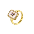 Detailed macro view of 18K gold plated square ring with purple gem and mother of pearl - Rectangular Purple Zirconia Ring