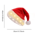 Red plush Christmas hat with LED lights and white pompom showing size dimensions - Long Plush Red With Warm LED