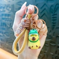 Mignon porte-clés capybara en PVC souple avec un charmant sweat à capuche dinosaure - Capybara en Résine-Chapeau Dino