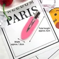 Detail showing 6cm matte pink hair clip with silver metal closure on white card - Pink