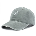 Detailed close-up of white heart embroidery on a vintage washed grey cotton baseball cap - Adjustable / Gray