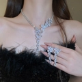 Close-up of model wearing silver crystal flower necklace and teardrop earrings set - 16# Necklace-Silver
