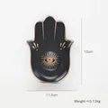 Detail der Hamsa-Hand-Schmuckschale mit Maßen 16cm x 11,5cm in Schwarz und Gold - Böser Blick Wimpern (Schwarz) Platte