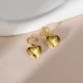 Elegant 18K gold plated heart shaped hoop earrings displayed on a soft neutral fabric - Gold - Heart Shape