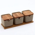 Minimalist beige ceramic seasoning jar set with bamboo lids, spoons, and wooden base tray - Type B Square Ceramic Jar 3-Piece Set