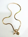 Gold flat snake chain necklace with pearl, lightning bolt, and textured heart pendant - Letter Z