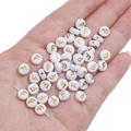 Flat round white acrylic bead with gold letter F for DIY jewelry and crafts - Letter F