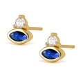 Close-up of gold stud earrings featuring marquise blue stones and white zircon accents - Gold Blue Zirconia