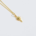 Golden Radiant Star pendant necklace with delicate chain shown on a white background - Gold Polished Eight-pointed Star